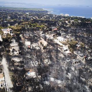 L'été dernier, des incendies meurtriers ont ravagé la ville de Mati. [Keystone/Eurokinissi via AP - Antonis Nikolopoulos]