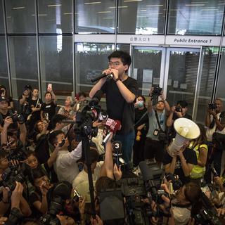 L'activiste prodémocratie Joshua Wong appelle à la démission de Carrie Lam. [Keystone/EPA - Roman Pilipey]