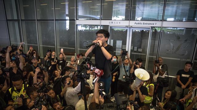 L'activiste prodémocratie Joshua Wong appelle à la démission de Carrie Lam. [Keystone/EPA - Roman Pilipey]