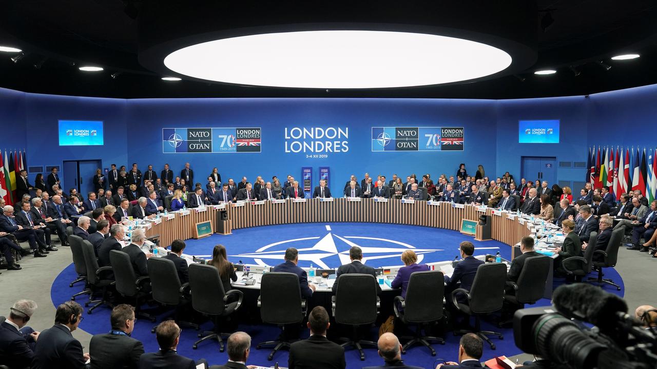 Les 29 membres de l'OTAN adoptent une déclaration finale malgré les tensions. [Reuters - Kevin Lamarque]