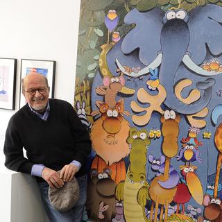 Le dessinateur argentin Guillermo Mordillo lors de son exposition en Autriche en 2015. [EPA/Keystone - Herbet Pfarrhofer]