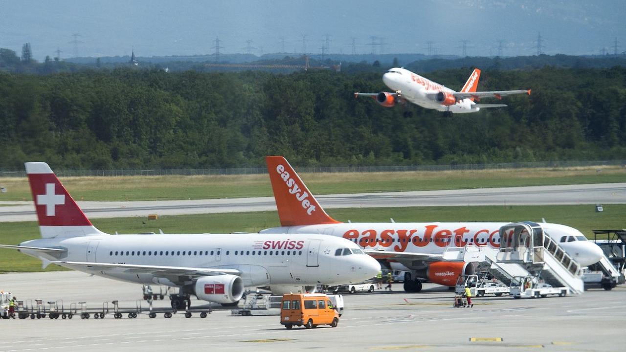 L'Etat de Genève veut limiter les voyages en avion. [Keystone - Jean-Christophe Bott]