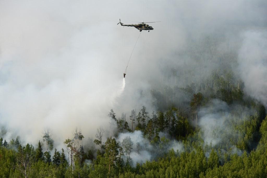 La Russie avait finalement envoyé l'armée pour faire face aux incendies en Sibérie début août. [AFP - Alexandr Kryazhev]