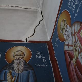 Des icônes religieuses de l'Eglise orthodoxe grecque dans un village du nord de la Grèce. [AP Photo/Keystone - Thanassis Stavrakis]