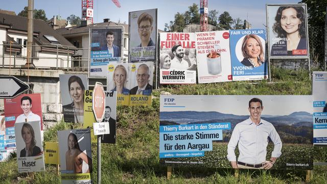 Affiches de campagne pour les élections fédérales. [Keystone - Christian Beutler]