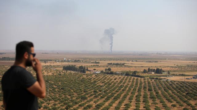 La ville de Ras al Aïn est visible depuis le côté turc de la frontière. [Reuters - Stoyan Nenov]