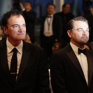Dans son dernier film, Quentin Tarantino a réuni Leonardo di Caprio et Brad Pitt. [AP Photo/Keystone - PETROS GIANNAKOURIS]