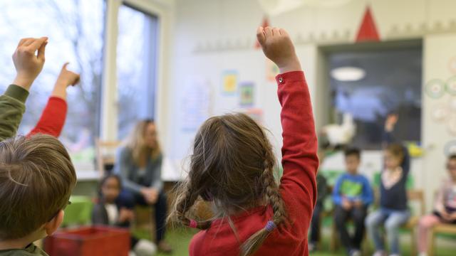 Des enfants dans une crèche. [Keystone - Christian Beutler]