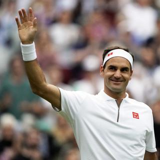 Roger Federer affronte Kei Nishikori à Wimbledon. [Keystone - Nic Bothma]