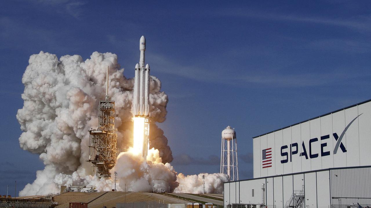 Une fusée Falcon 9 de la compagnie SpaceX au décollage. [Orlando Sentinel/AP/Keystone - Red Huber]