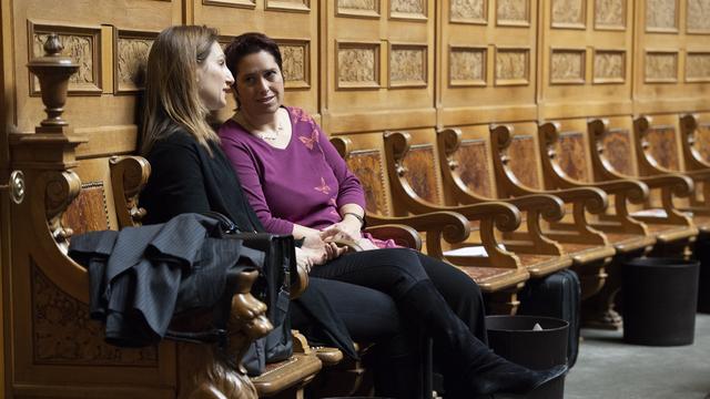 Adèle Thorens (Verts) et Isabelle Chevalley (Vert'libéraux) au Palais fédéral, le 12 mars 2019. [Keystone - Anthony Anex]