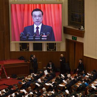 Le Premier ministre chinois Li Keqiang a présenté une série de mesures visant à soulager les entreprises du pays lors du Congrès national populaire, mardi 5 mars. [AP Photo/Keystone - Ng Han Guan]