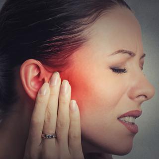 Les douleurs à l'oreille peuvent être traitées par l'ostéopathie. 
Depositphotos [SIphotography]