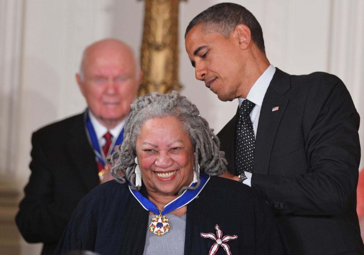 (FILES) In this file photo taken on May 29, 2012 US President Barack Obama presents the Presidential Medal of Freedom to author Toni Morrison during a ceremony in the East Room of the White House in Washington,DC. Toni Morrison, the first African American woman to win the Nobel Prize for Literature, has died following a short illness, her family said in a statement on August 6, 2019. She was 88. "Although her passing represents a tremendous loss, we are grateful she had a long, well lived life," they said. [AFP - Mandel NGAN]