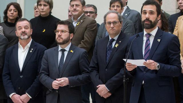 Douze responsables du gouvernement régional catalan sont accusés de rébellion, leur procès débutera mardi. [KEystone/EPA - Quique Gracia]