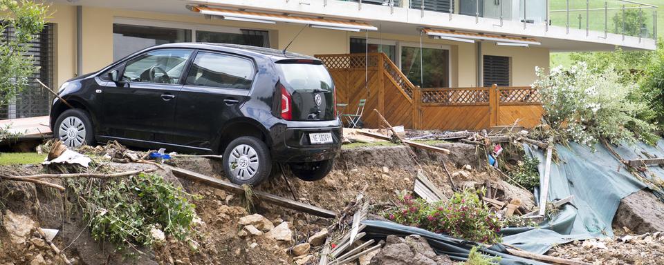 Les villages de Dombresson et Villiers ont été dévastés par les violents orages. [Keystone - Laurent Gillieron]