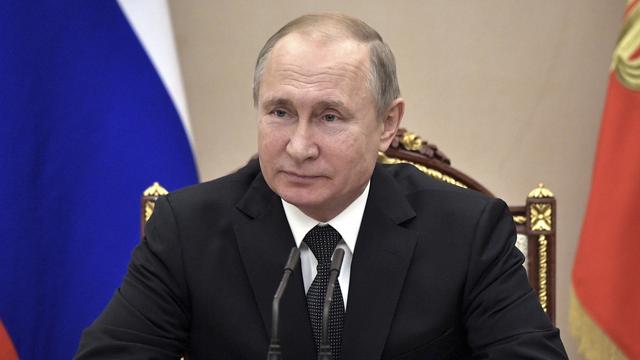 Vladimir Poutine a à son tour annoncé le retrait de la Russie du traité sur les armes nucléaires. [Keystone - Alexei Nikolsky, Sputnik, Kremlin Pool Photo via AP]