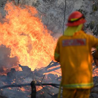 Des incendies non-contrôlés en Australie ont détruit plus de 150 maisons [EPA/Keystone - Dan Peled]