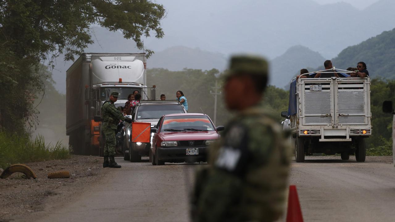 Près de 800 migrants entassés dans des camions arrêtés au Mexique. [KEYSTONE - REBECCA BLACKWELL]