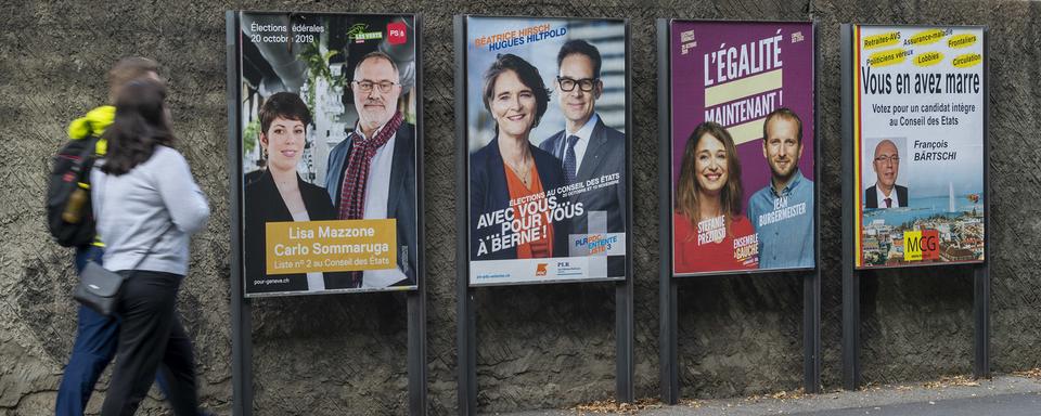 Des affiches pour les élections fédérales 2019 à Genève. [Keystone - Martial Trezzini]