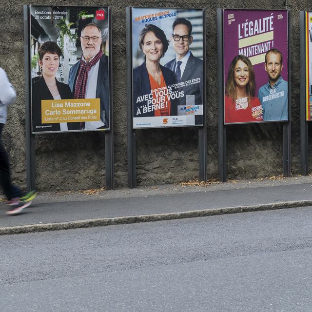 Des affiches pour les élections fédérales 2019 à Genève. [Keystone - Martial Trezzini]