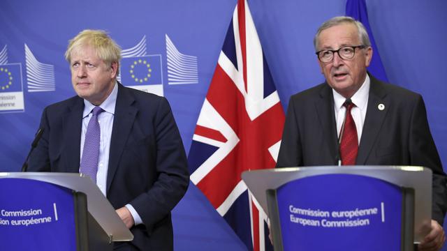 Boris Johnson et Jean-Claude Juncker. [AP/Keystone - Francisco Seco]