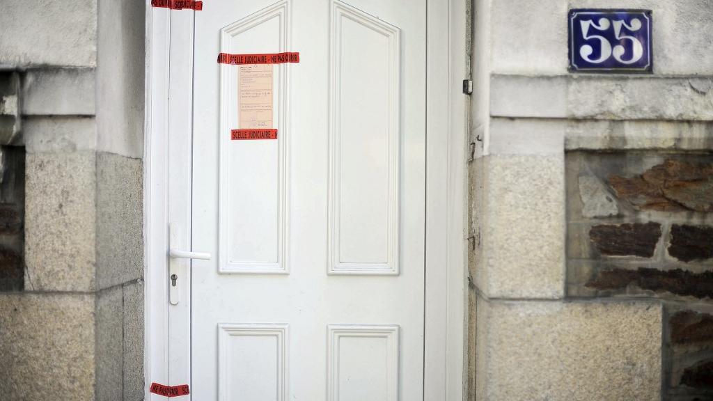 La porte de la maison de la famille assassinée à Nantes en 2011. [AFP - Jean-Sébastien Evrard]