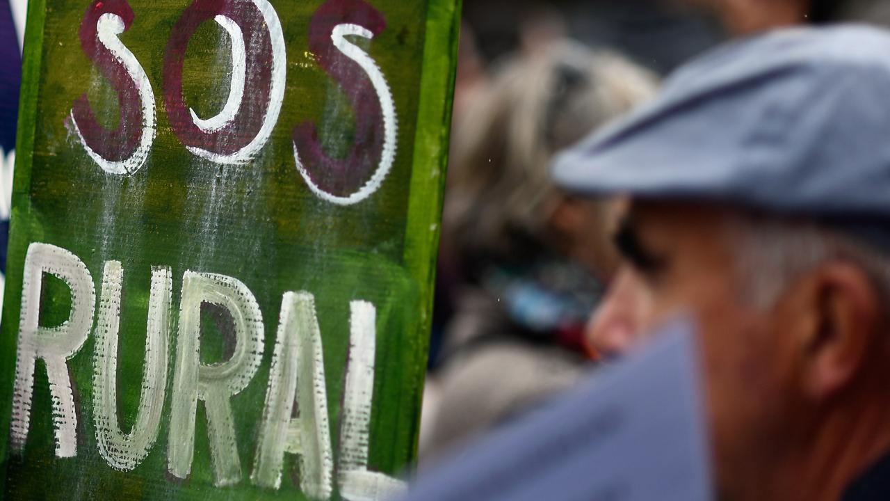 Un manifestant du défilé contre le dépeuplement de l'intérieur de l'Espagne à Madrid [AFP - Oscar Del Pozo]