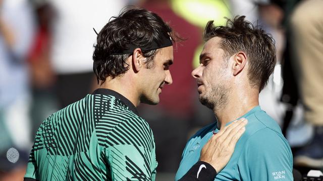 Federer et Wawrinka s'affronteront pour le 3e tour du tournois de l'Indian Wells. [Keystone - Paul Buck]
