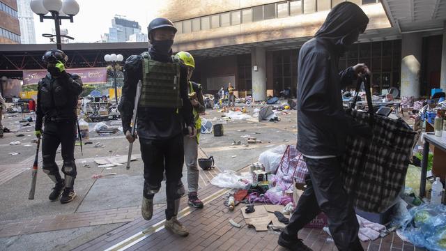 Les derniers occupants de l'Université polytechnique (PolyU) sont bien décidés  à résister. Photo prise le mardi 19 novembre 2019. [Keystone - Ng Han Guan]