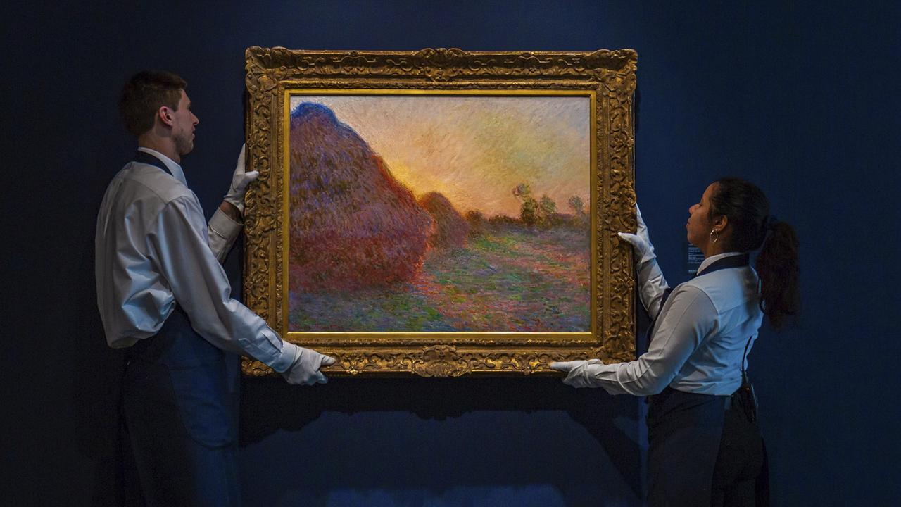La toile, qui  fait partie de la série les "Meules",  a été peinte par Monet durant l'hiver 1890-1891 dans sa maison de Giverny, en Normandie. [Keystone - Courtesy Sotheby's via AP]