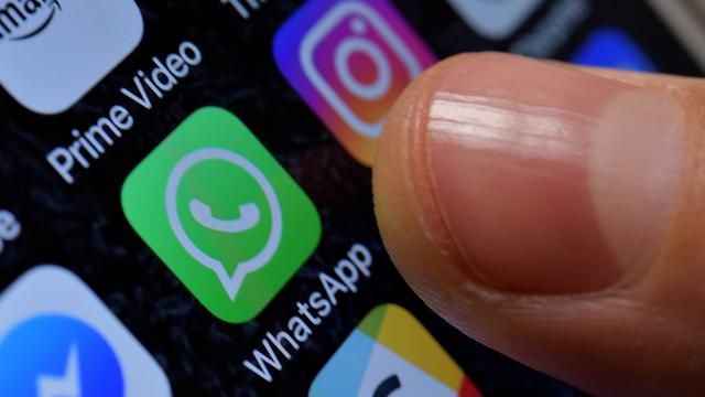 WhatsApp a été victime d'une attaque. [Keystone - EPA/Sascha Steinbach]