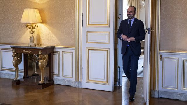 Edouard Philippe réunit tous ses ministres avant le début d'une grève prévue jeudi. [Keystone - EPA/Thomas Samson]