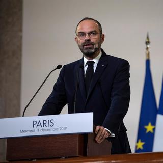 Le Premier ministre français Edouard Philippe a dévoilé le contenu de la controversée réforme des retraites. [Keystone / EPA - Thomas Samson / Pool]