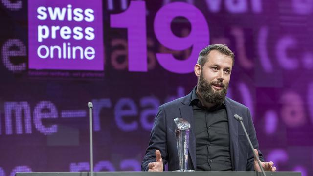 Pierre Pistoletti, rédacteur en chef de cath.ch, a été récompensé par le Swiss Press Award 2019, catégorie "online" pour son enquête intitulée "Lorsque le berger est un loup". [Keystone - Alessandro della Valle]