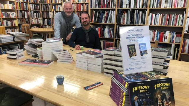 Marc Voltenauer et Nicolas Feuz en dédicace à la librairie La Liseuse à Sion. [facebook.com/marcvoltenauer]