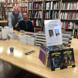 Marc Voltenauer et Nicolas Feuz en dédicace à la librairie La Liseuse à Sion. [facebook.com/marcvoltenauer]