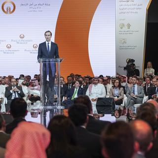 Jared Kushner, le conseiller et gendre du président américain Donald Trump, prononce son discours lors de la conférence de Bahrein. [Keystone/AP]
