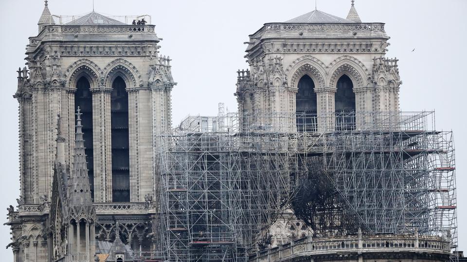 Au lendemain de l'incendie de la toiture de Notre-Dame de Paris. [EPA/Keystone - Ian Langsdon]