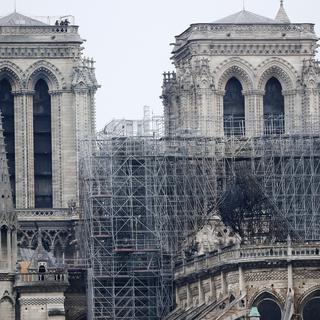 Au lendemain de l'incendie de la toiture de Notre-Dame de Paris. [EPA/Keystone - Ian Langsdon]