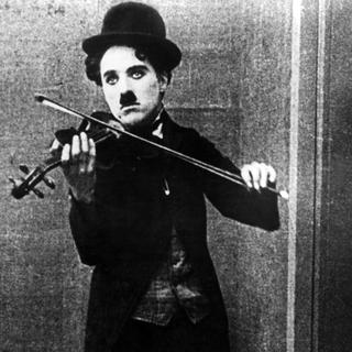 Charlie Chaplin dans "Le Vagabond". [AFP - LONE STAR CORPORATION / COLLECTION CHRISTOPHEL]