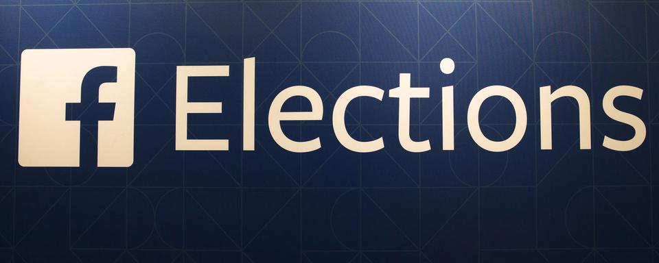 Le logo de Facebook Elections. [Keystone - John Minchillo]