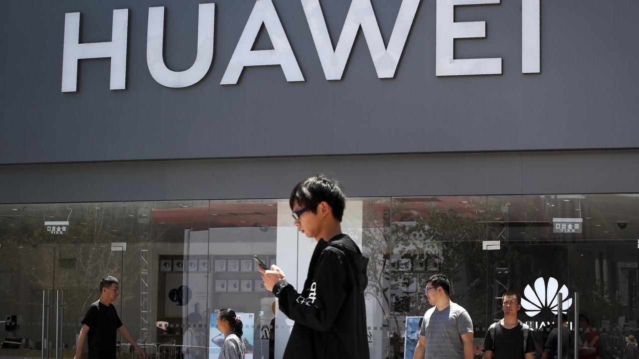 Un magasin Huawei à Pékin, photographié fin juin 2019. [AP Photo - Andy Wong]