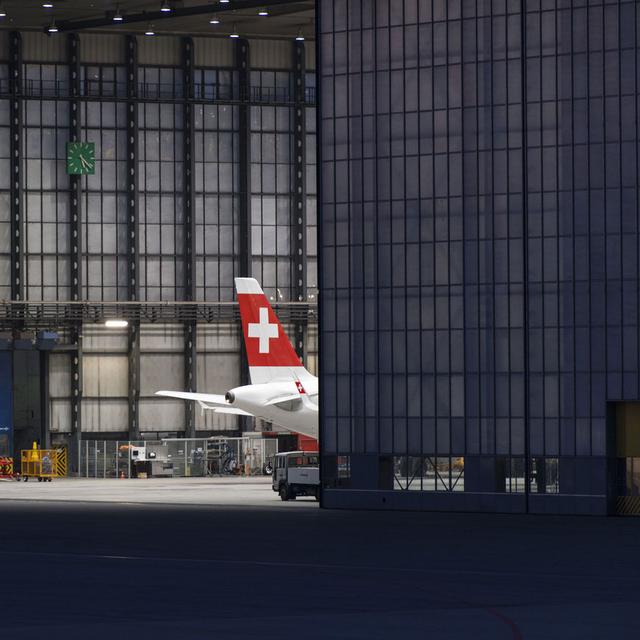 Un avion de la compagnie "Swiss" en révision à l'aéroport de Zurich. [Keystone - Christian Beutler]