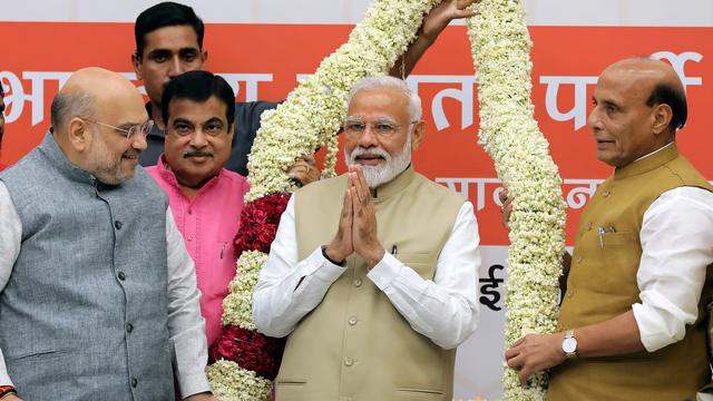 Narendra Modi et son parti sont en tête des législatives en Inde. [Keystone - EPA/Harish Tyagi]