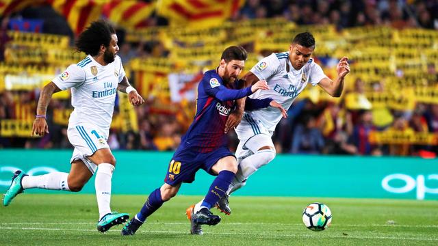 Marcelo, Lionel Messi et Casemiro ne se retrouveront pas à la fin octobre. Le Clasico est repoussé. [KEYSTONE]