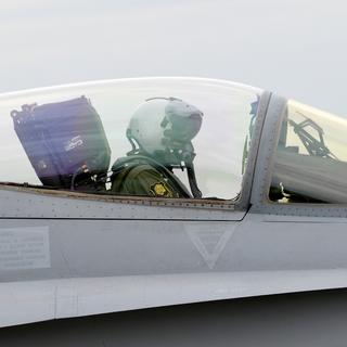 Pilote dans le cockpit d'un avion FA-18 des forces aériennes de l'armée Suisse.
Christian Brun
Keystone [Christian Brun]