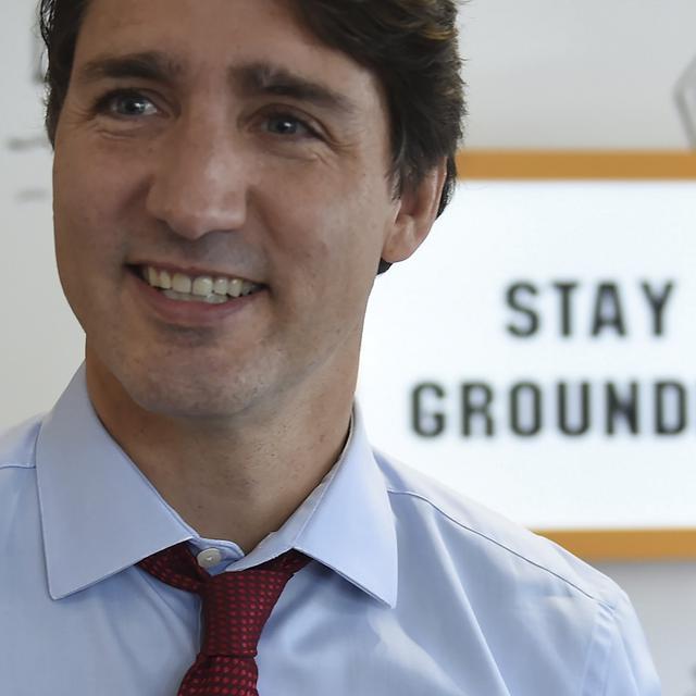 Justin Trudeau esquisse un sourire lors d'une journée de campagne à Toronto à un mois des élections canadiennes [AP/Keystone - Sean Kilpatrick/The Canadian Press]