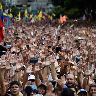 Une manifestation de soutien au président du Parlement du Venezuela, qui s'est autoproclamé chef de l'Etat, mercredi à Caracas. [AFP - Federico Parra]