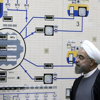 Le président iranien Hassan Rohani en visite dans une installation nucléaire en 2015. [AP Photo/Iranian Presidency Office/Keystone - Mohammad Berno]